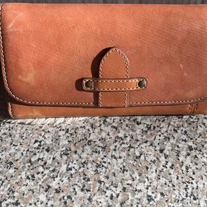 Brown leather Frye wallet. Used a hand full of times.